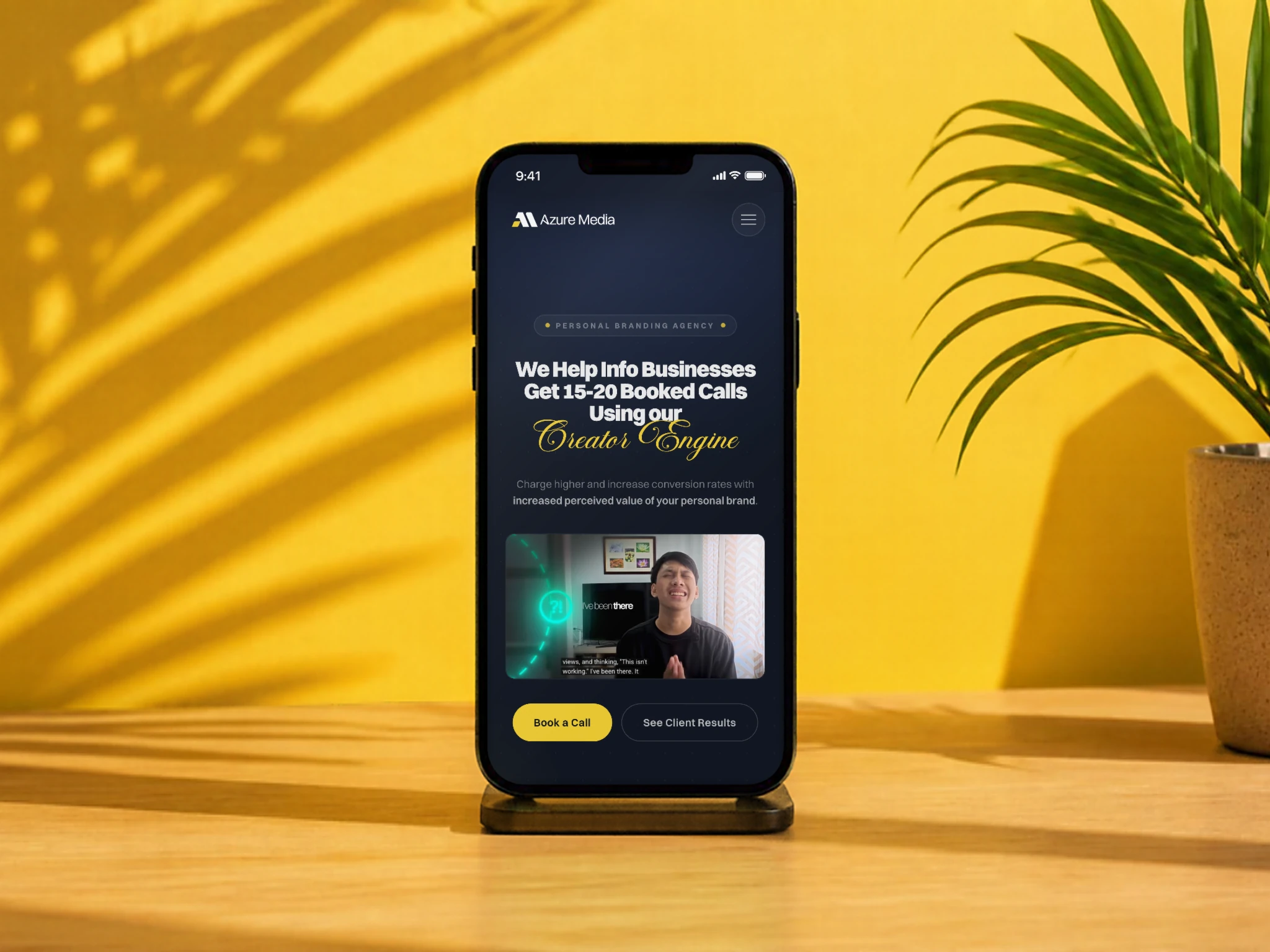 Azure Media's new website on a phone on a sunny table